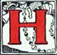 A decorative red letter H on cream, decorated with sprigs of holly and berries.