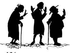 Three old men stand talking and gesturing, each leaning on a walking stick.
